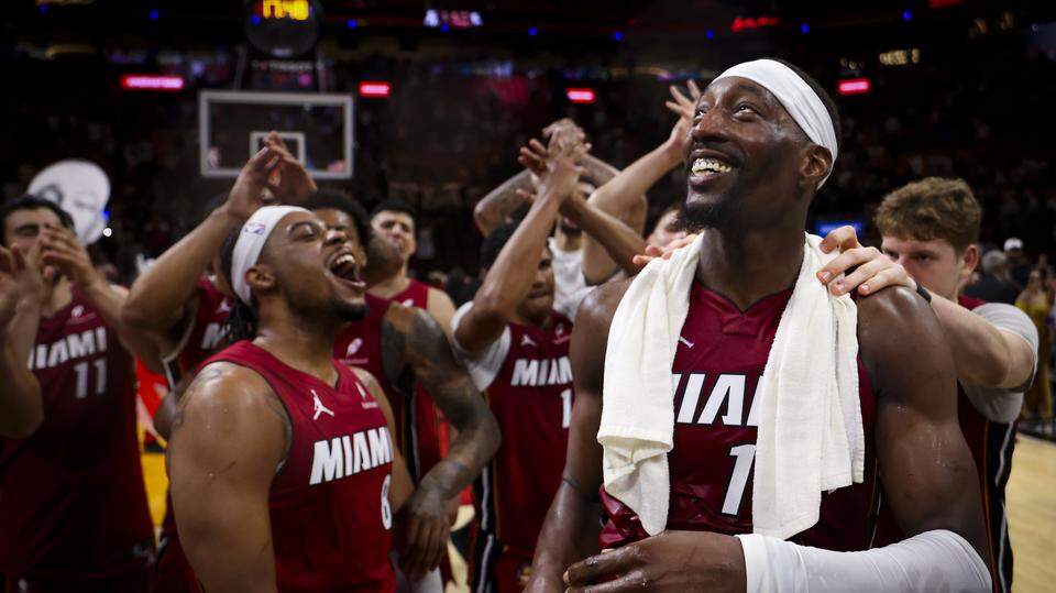 Miami Heat center Bam Adebayo (13) celebrates with teammates after scoring 83 points against the Washington Wizards, the second-highest single-game total in NBA history, Tuesday, March 10, 2026, at Kaseya Center in Miami. The Heat won 150-129. Alie Skowronski askowronski@miamiherald.com