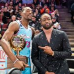 February 15, 2020; Chicago, Illinois, USA; Miami Heat center Bam Adebayo (13) poses with former NBA player Dwyane Wade (right) after winning the skills challenge during NBA All Star Saturday Night at United Center. Mandatory Credit: Kyle Terada-Imagn Images