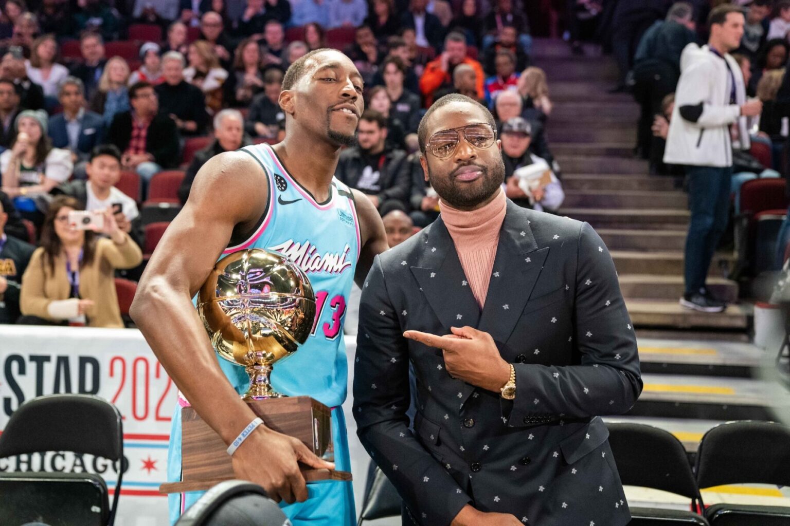 February 15, 2020; Chicago, Illinois, USA; Miami Heat center Bam Adebayo (13) poses with former NBA player Dwyane Wade (right) after winning the skills challenge during NBA All Star Saturday Night at United Center. Mandatory Credit: Kyle Terada-Imagn Images