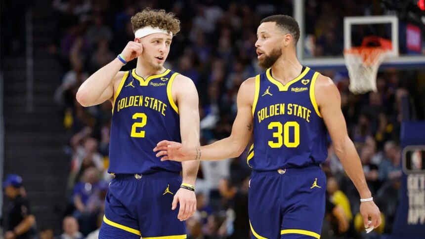 SAN FRANCISCO, CALIFORNIA - FEBRUARY 22: Stephen Curry #30 of the Golden State Warriors talks to teammate Brandin Podziemski #2 in the first half against the Los Angeles Lakers at Chase Center on February 22, 2024 in San Francisco, California. NOTE TO USER: User expressly acknowledges and agrees that, by downloading and or using this photograph, User is consenting to the terms and conditions of the Getty Images License Agreement. (Photo by Lachlan Cunningham/Getty Images)