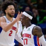 Mar 17, 2025; New Orleans, Louisiana, USA; Detroit Pistons guard Cade Cunningham (2) celebrates a basket with guard Dennis Schroder (17) against the New Orleans Pelicans during the second half at Smoothie King Center. Mandatory Credit: Matthew Hinton-Imagn Images | Matthew Hinton-Imagn Images