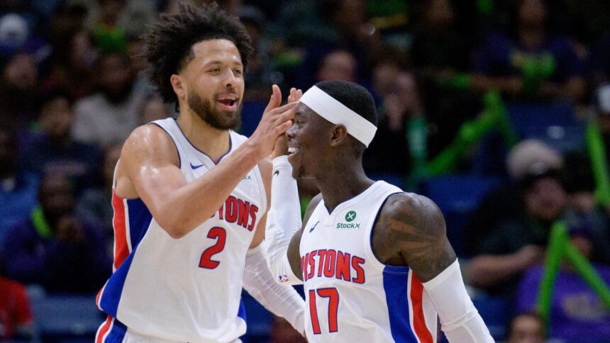 Mar 17, 2025; New Orleans, Louisiana, USA; Detroit Pistons guard Cade Cunningham (2) celebrates a basket with guard Dennis Schroder (17) against the New Orleans Pelicans during the second half at Smoothie King Center. Mandatory Credit: Matthew Hinton-Imagn Images | Matthew Hinton-Imagn Images