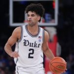 Cayden Boozer looks to pass the ball during a game. Mandatory Credit: AP Photo - Frank Franklin II