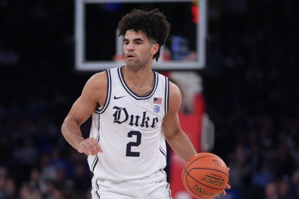 Cayden Boozer looks to pass the ball during a game. Mandatory Credit: AP Photo - Frank Franklin II