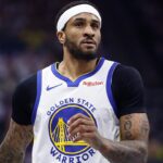 SACRAMENTO, CALIFORNIA - NOVEMBER 28: Gary Payton II #0 of the Golden State Warriors looks on in the first quarter against the Sacramento Kings during the NBA In-Season Tournament game at Golden 1 Center on November 28, 2023 in Sacramento, California.