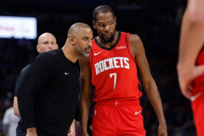 Oct 21, 2025; Oklahoma City, Oklahoma, USA; Houston Rockets head coach Ime Udoka talks to forward Kevin Durant (7) during a break in play against the Oklahoma City Thunder during the second half at Paycom Center. Mandatory Credit: Alonzo Adams-Imagn Images