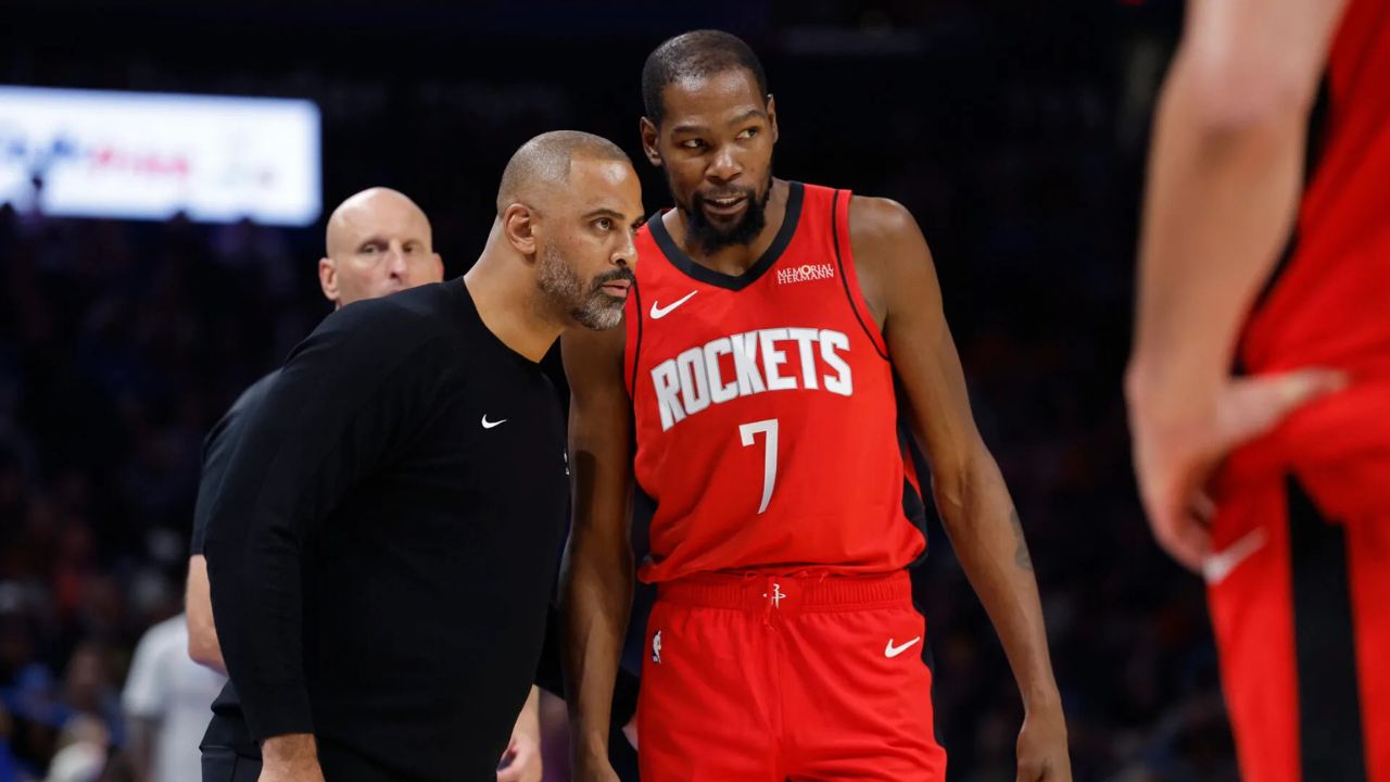 Oct 21, 2025; Oklahoma City, Oklahoma, USA; Houston Rockets head coach Ime Udoka talks to forward Kevin Durant (7) during a break in play against the Oklahoma City Thunder during the second half at Paycom Center. Mandatory Credit: Alonzo Adams-Imagn Images