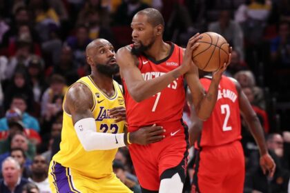 Mar 16, 2026; Houston, Texas, USA; Los Angeles Lakers forward LeBron James (23) defends against Houston Rockets forward Kevin Durant (7) during the fourth quarter at Toyota Center. Mandatory Credit: Troy Taormina-Imagn Images