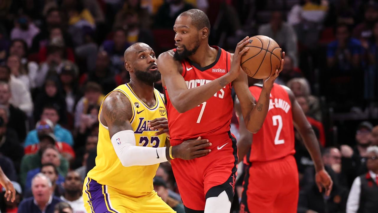 Mar 16, 2026; Houston, Texas, USA; Los Angeles Lakers forward LeBron James (23) defends against Houston Rockets forward Kevin Durant (7) during the fourth quarter at Toyota Center. Mandatory Credit: Troy Taormina-Imagn Images