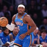 Mar 4, 2026; New York, New York, USA; Oklahoma City Thunder guard Luguentz Dort (5) dribbles up court against the New York Knicks during the first half at Madison Square Garden. Mandatory Credit: Vincent Carchietta-Imagn Images