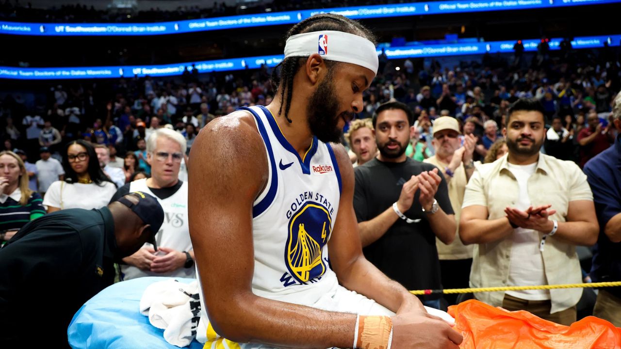 Mar 23, 2026; Dallas, Texas, USA; Golden State Warriors guard Moses Moody (4) leaves the court on a stretcher during overtime against the Dallas Mavericks at American Airlines Center. Mandatory Credit: Kevin Jairaj-Imagn Images