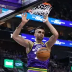 Apr 11, 2024; Salt Lake City, Utah, USA; Utah Jazz center Omer Yurtseven (77) dunks the ball against the Houston Rockets during the first quarter at Delta Center. Mandatory Credit: Rob Gray-Imagn Images