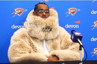 Shai Gilgeous-Alexander pulls off wild outfit for press conference. Mandatory Credit: YouTube - Oklahoma City Thunder