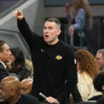Los Angeles Lakers assistant coach Greg St. Jean (center) yells during the third quarter against the Golden State Warriors at Chase Center.