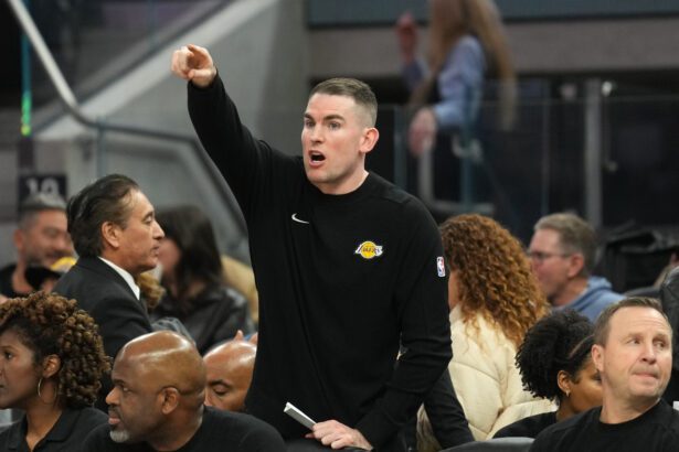Los Angeles Lakers assistant coach Greg St. Jean (center) yells during the third quarter against the Golden State Warriors at Chase Center.
