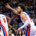 Detroit Pistons guard Cade Cunningham (2) reacts after a score next to center Jalen Duren (0) during the first half against the New Orleans Pelicans at Smoothie King Center. Mandatory Credit: Matthew Hinton-Imagn Images