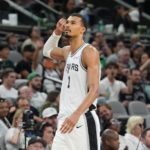 San Antonio Spurs forward Victor Wembanyama (1) walks off the court in the second half against the Boston Celtics at Frost Bank Center.