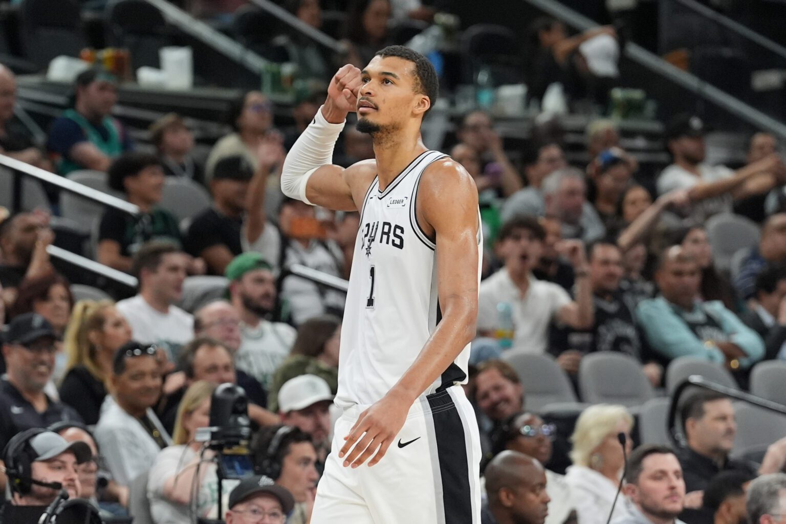 San Antonio Spurs forward Victor Wembanyama (1) walks off the court in the second half against the Boston Celtics at Frost Bank Center.
