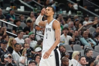 San Antonio Spurs forward Victor Wembanyama (1) walks off the court in the second half against the Boston Celtics at Frost Bank Center.