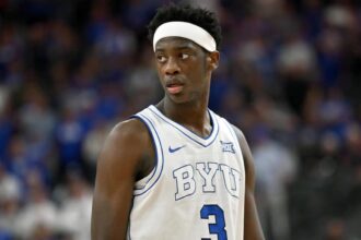 LAS VEGAS, NEVADA - NOVEMBER 03: AJ Dybantsa #3 of the BYU Cougars looks on during the first half of a Hall of Fame Series game against the Villanova Wildcats at T-Mobile Arena on November 03, 2025 in Las Vegas, Nevada.