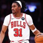 Chicago Bulls guard Jaden Ivey dribbles the ball.