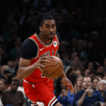 Chicago Bulls guard Jaden Ivey (31) brings the ball up the court against the Boston Celtics during the second half at TD Garden.