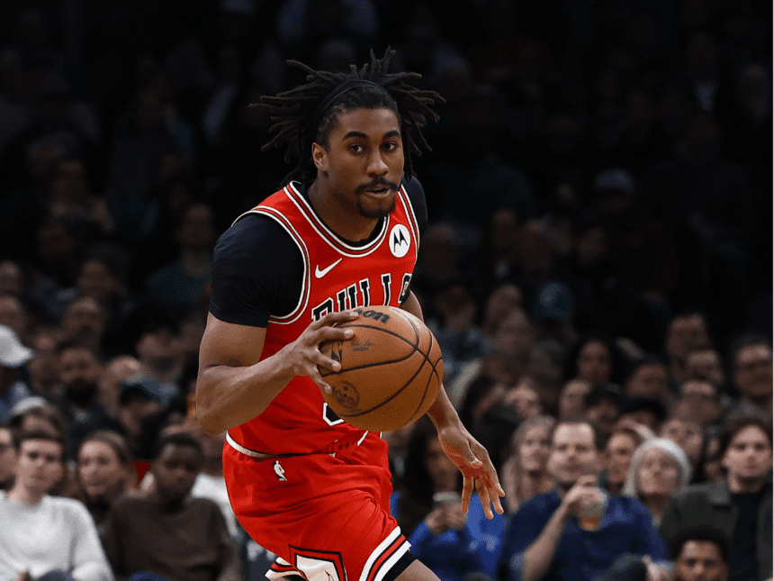 Chicago Bulls guard Jaden Ivey (31) brings the ball up the court against the Boston Celtics during the second half at TD Garden.