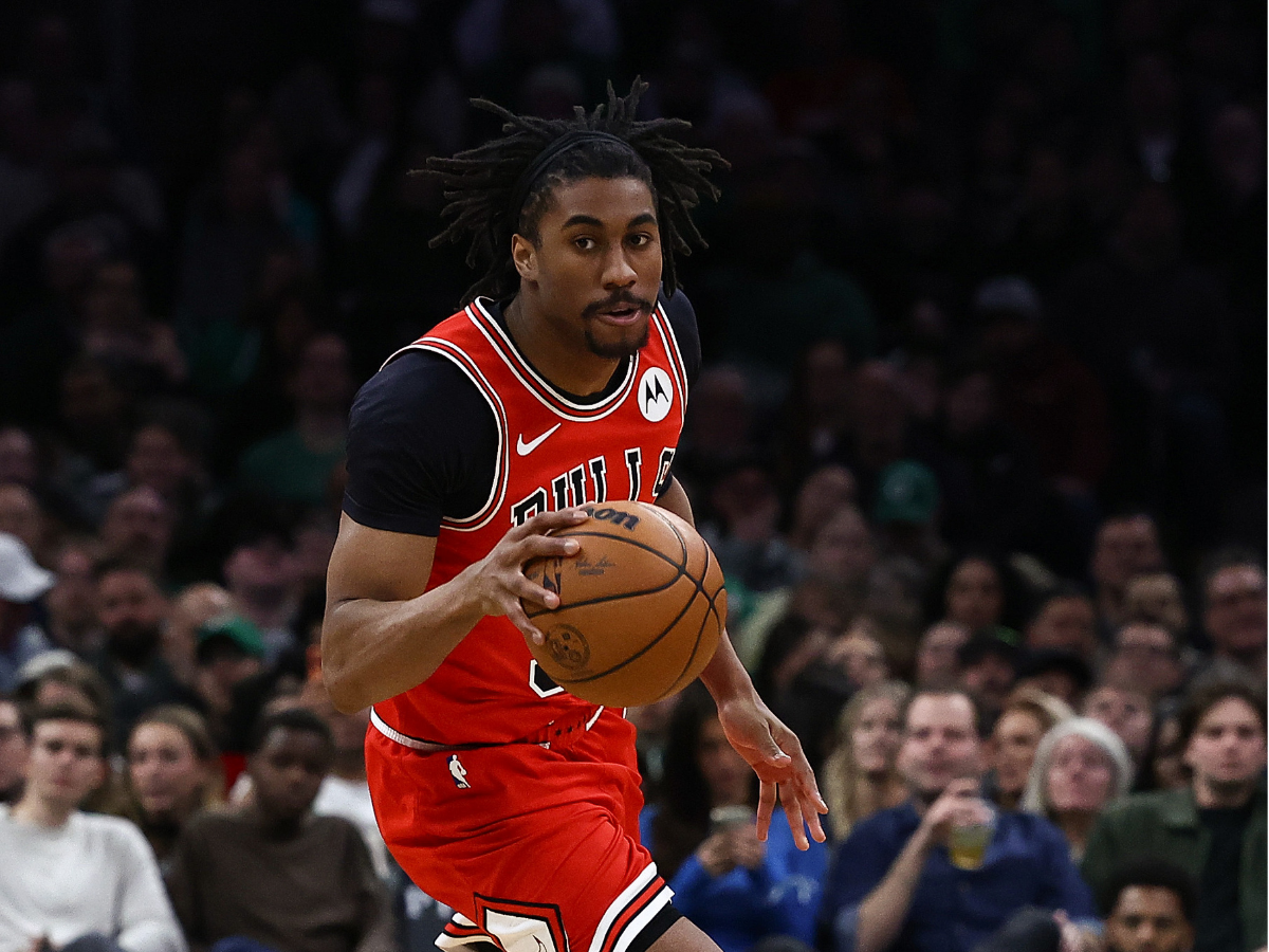Chicago Bulls guard Jaden Ivey (31) brings the ball up the court against the Boston Celtics during the second half at TD Garden.