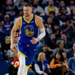Golden State Warriors center Kristaps Porzingis (7) celebrates during the third quarter against the Chicago Bulls at Chase Center.