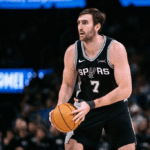 OKLAHOMA CITY, OKLAHOMA - DECEMBER 25: Luke Kornet #7 of the San Antonio Spurs brings the ball up court during the second half against the Oklahoma City Thunder at Paycom Center on December 25, 2025 in Oklahoma City, Oklahoma. NOTE TO USER: User expressly acknowledges and agrees that, by downloading and or using this photograph, User is consenting to the terms and conditions of the Getty Images License Agreement.