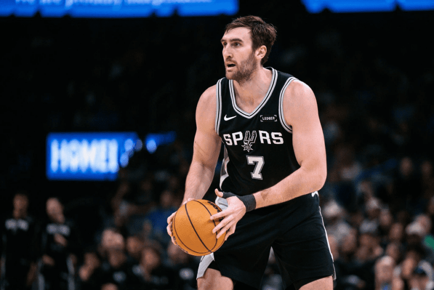OKLAHOMA CITY, OKLAHOMA - DECEMBER 25: Luke Kornet #7 of the San Antonio Spurs brings the ball up court during the second half against the Oklahoma City Thunder at Paycom Center on December 25, 2025 in Oklahoma City, Oklahoma. NOTE TO USER: User expressly acknowledges and agrees that, by downloading and or using this photograph, User is consenting to the terms and conditions of the Getty Images License Agreement.