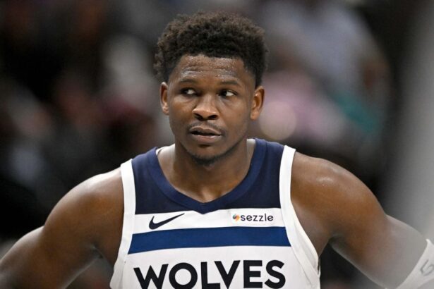 Mar 30, 2026; Dallas, Texas, USA; Minnesota Timberwolves guard Anthony Edwards (5) looks on during the second half against the Dallas Mavericks at the American Airlines Center. Mandatory Credit: Jerome Miron-Imagn Images