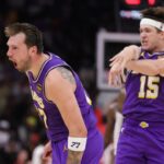 HOUSTON, TEXAS - MARCH 18: Austin Reaves #15 of the Los Angeles Lakers celebrates with Luka Doncic #77 of the Los Angeles Lakers during the second half against the Houston Rockets at Toyota Center on March 18, 2026 in Houston, Texas. (Photo by Alex Slitz/Getty Images)