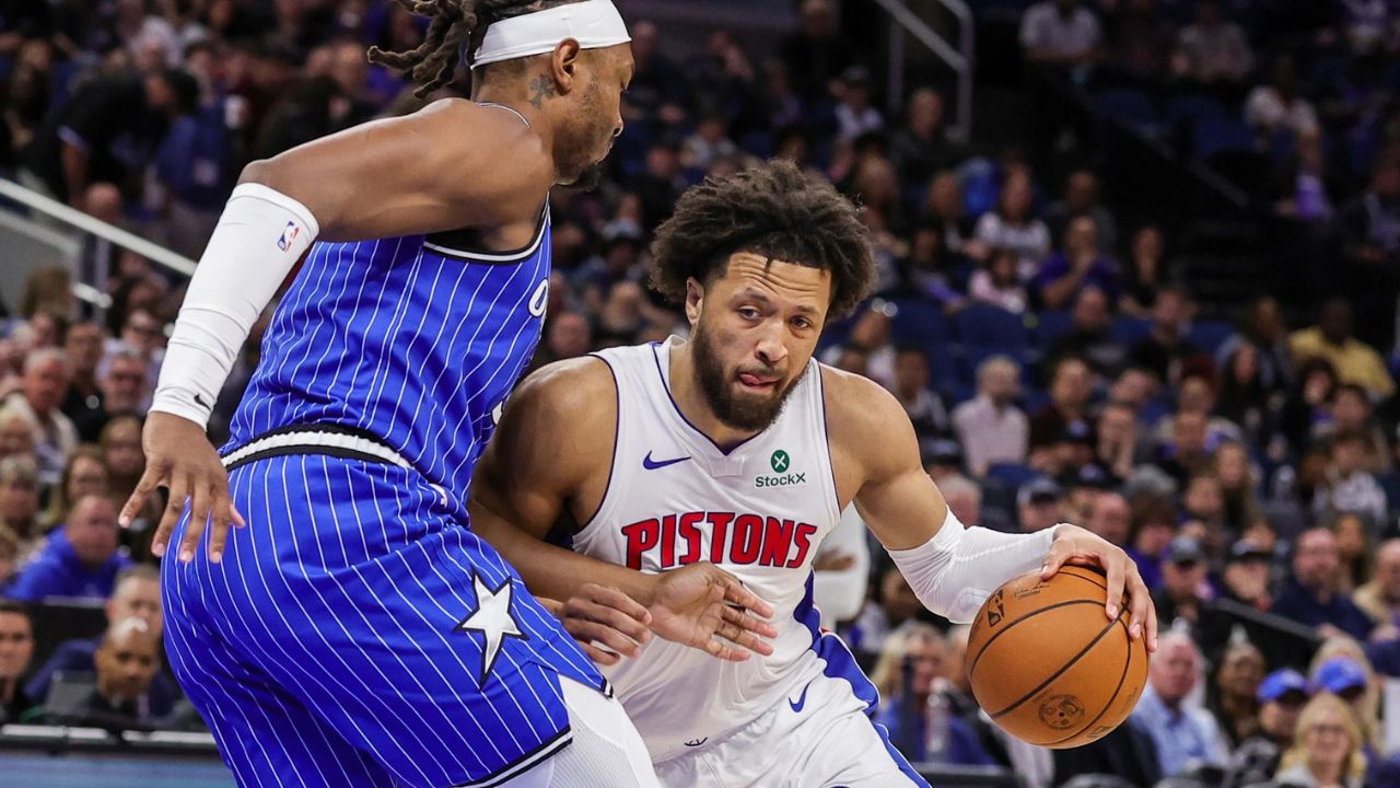 Mar 1, 2026; Orlando, Florida, USA; Detroit Pistons guard Cade Cunningham (2) drives against Orlando Magic center Wendell Carter Jr. (34) during the first quarter at Kia Center. Mandatory Credit: Mike Watters-Imagn Images