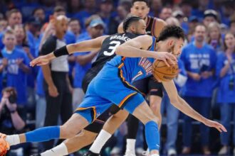 Apr 19, 2026; Oklahoma City, Oklahoma, USA; Oklahoma City Thunder center Chet Holmgren (7) drives around Phoenix Suns forward Dillon Brooks (3) in the first quarter during game one of the first round of the 2026 NBA Playoffs at Paycom Center. Mandatory Credit: Alonzo Adams-Imagn Images