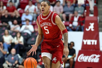 Feb 18, 2026; Tuscaloosa, Alabama, USA; Arkansas Razorback guard Darius Acuff Jr. (5) dribbles a fast break during the first half against the Alabama Crimson Tide at Coleman Coliseum. Mandatory Credit: David Leong-Imagn Images