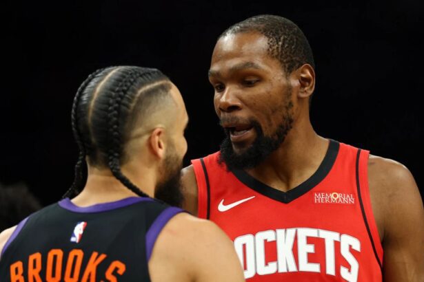 Apr 7, 2026; Phoenix, Arizona, USA; Houston Rockets forward Kevin Durant (7) argues with Phoenix Suns forward Dillon Brooks (3) in the first half at Mortgage Matchup Center. Mandatory Credit: Mark J. Rebilas-Imagn Images
