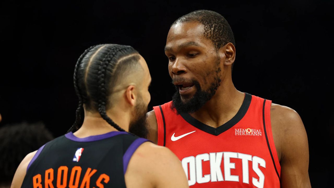 Apr 7, 2026; Phoenix, Arizona, USA; Houston Rockets forward Kevin Durant (7) argues with Phoenix Suns forward Dillon Brooks (3) in the first half at Mortgage Matchup Center. Mandatory Credit: Mark J. Rebilas-Imagn Images