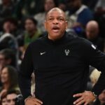 Apr 3, 2026; Milwaukee, Wisconsin, USA; Milwaukee Bucks head coach Doc Rivers looks on in the second quarter against the Boston Celtics at Fiserv Forum. Mandatory Credit: Benny Sieu-Imagn Images