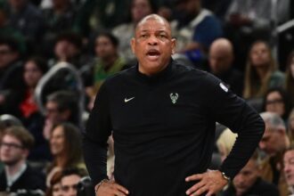 Apr 3, 2026; Milwaukee, Wisconsin, USA; Milwaukee Bucks head coach Doc Rivers looks on in the second quarter against the Boston Celtics at Fiserv Forum. Mandatory Credit: Benny Sieu-Imagn Images