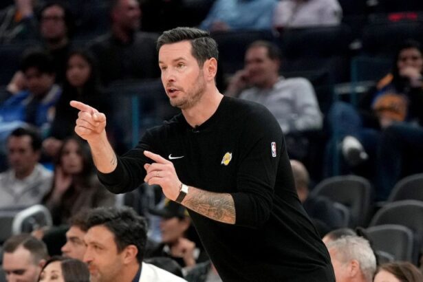 Apr 9, 2026; San Francisco, California, USA; Los Angeles Lakers head coach JJ Redick instructs his team against the Golden State Warriors in the fourth quarter at the Chase Center. Mandatory Credit: Cary Edmondson-Imagn Images
