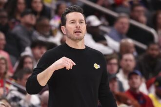 Mar 16, 2026; Houston, Texas, USA; Los Angeles Lakers head coach JJ Redick reacts during a play in the third quarter against the Houston Rockets at Toyota Center. Mandatory Credit: Troy Taormina-Imagn Images