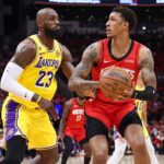 Apr 24, 2026; Houston, Texas, USA; Los Angeles Lakers forward LeBron James (23) defends against Houston Rockets forward Jabari Smith Jr. (10) during the first quarter during game three of the first round of the 2026 NBA Playoffs at Toyota Center. Mandatory Credit: Troy Taormina-Imagn Images