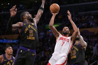 Apr 21, 2026; Los Angeles, California, USA; Houston Rockets forward Kevin Durant (7) is defended by Los Angeles Lakers center Deandre Ayton (5) as he drives to the basket during the second half of game two of the first round of the 2026 NBA Playoffs at Crypto.com Arena. Mandatory Credit: Jayne Kamin-Oncea-Imagn Images