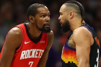 Apr 7, 2026; Phoenix, Arizona, USA; Houston Rockets forward Kevin Durant (7) argues with Phoenix Suns forward Dillon Brooks (3) in the first half at Mortgage Matchup Center. Mandatory Credit: Mark J. Rebilas-Imagn Images