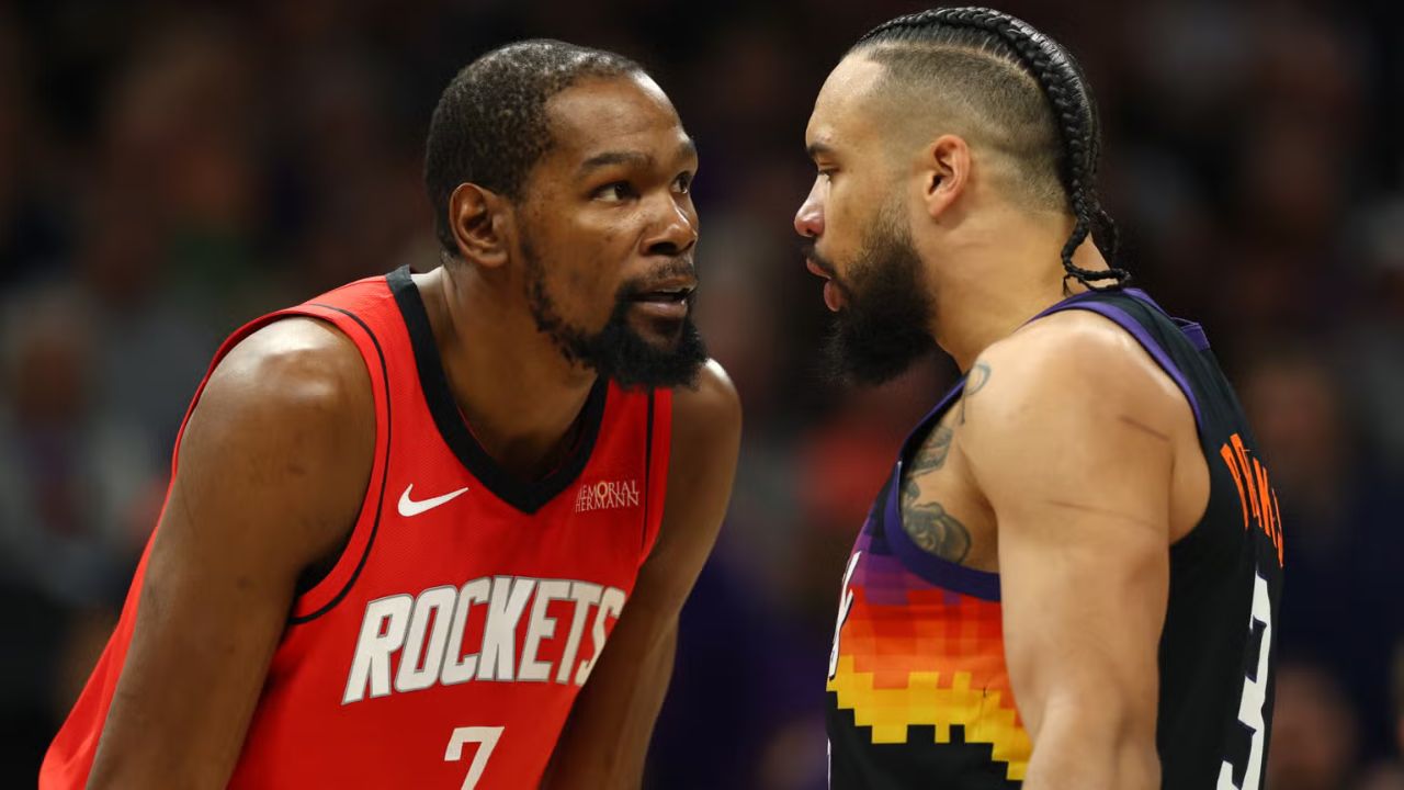 Apr 7, 2026; Phoenix, Arizona, USA; Houston Rockets forward Kevin Durant (7) argues with Phoenix Suns forward Dillon Brooks (3) in the first half at Mortgage Matchup Center. Mandatory Credit: Mark J. Rebilas-Imagn Images