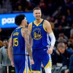 Mar 10, 2026; San Francisco, California, USA; Golden State Warriors center Kristaps Porzingis (7) and Golden State Warriors forward Gui Santos (15) celebrate during the third quarter against the Chicago Bulls at Chase Center. Mandatory Credit: Bob Kupbens-Imagn Images