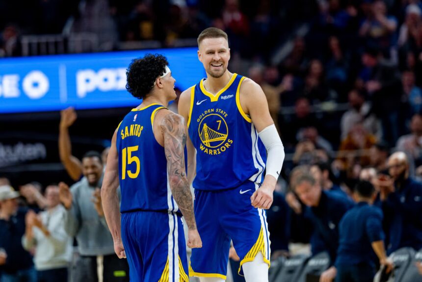 Mar 10, 2026; San Francisco, California, USA; Golden State Warriors center Kristaps Porzingis (7) and Golden State Warriors forward Gui Santos (15) celebrate during the third quarter against the Chicago Bulls at Chase Center. Mandatory Credit: Bob Kupbens-Imagn Images