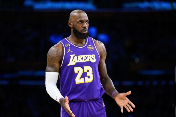 Mar 27, 2026; Los Angeles, California, USA; Los Angeles Lakers forward LeBron James (23) reacts during the first half against the Brooklyn Nets at Crypto.com Arena. Mandatory Credit: William Liang-Imagn Images