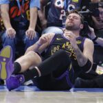 Apr 2, 2026; Oklahoma City, Oklahoma, USA; Los Angeles Lakers guard Luka Doncic (77) falls to the court during a play against the Oklahoma City Thunder during the third quarter at Paycom Center. Mandatory Credit: Alonzo Adams-Imagn Images